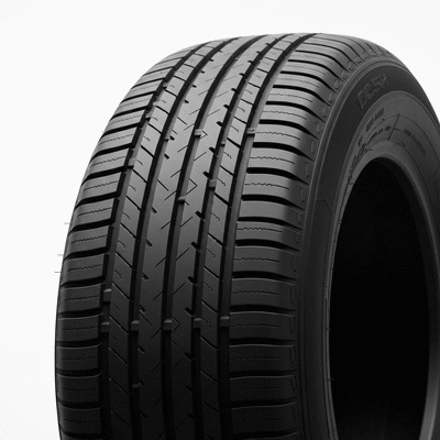 Close-up of a new tire with clear tread pattern on a clean background